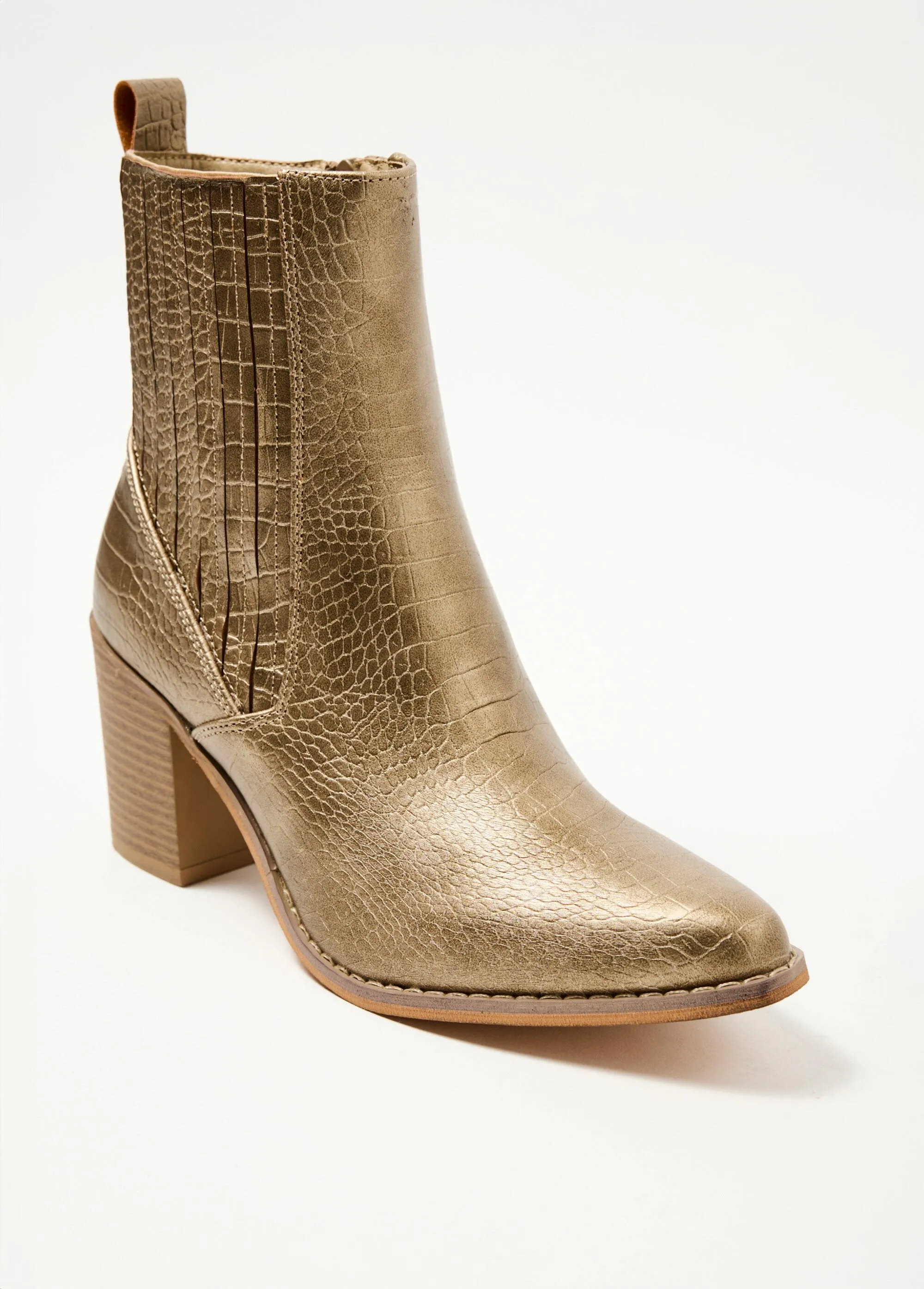 Reptile-style boots with pointed toe heels